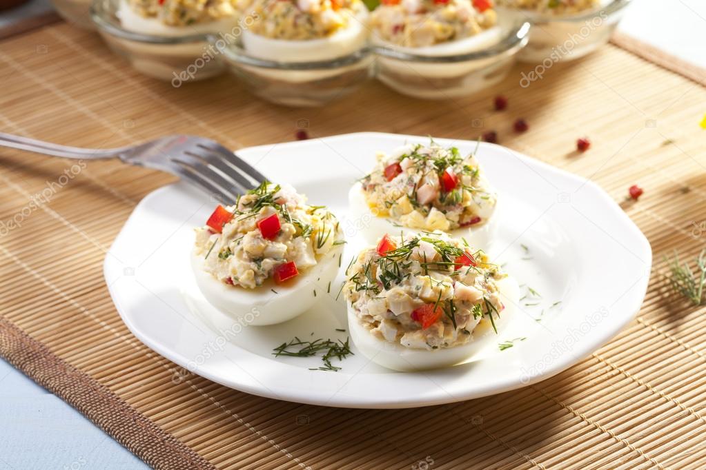 stuffed eggs with ham, red pepper and dill