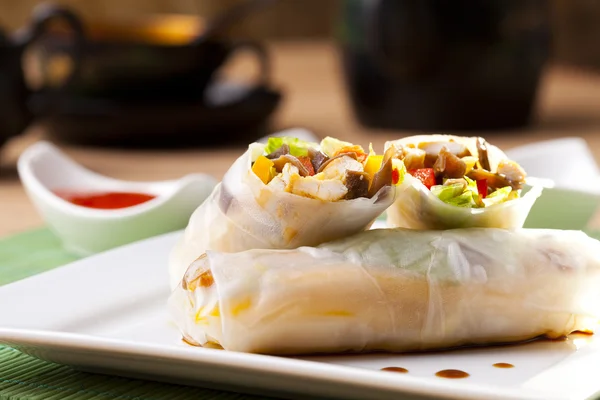 Portion of spring rolls on plate — Stock Photo, Image