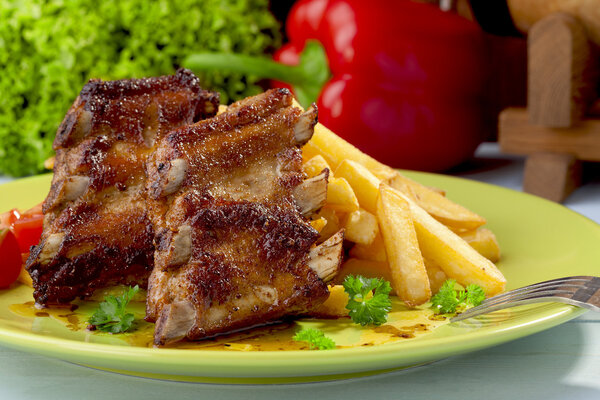 Grilled ribs on plate
