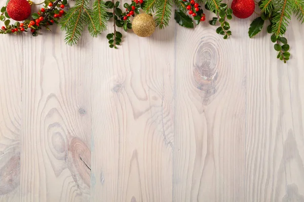 Christmas decoration. Wooden background of boards. Frame ready for your text.