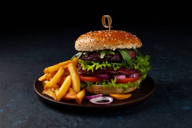 Vejetaryen burger. Kötü ruh hali. Siyah arkaplan.