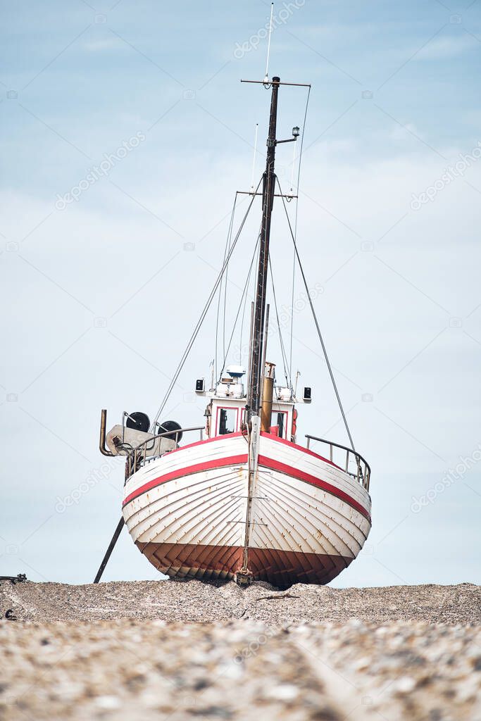 Boat lying on the beach. High quality photo