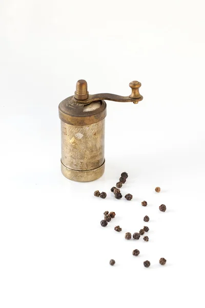 Vintage bronze pepper mill isolated on white background — Stock Photo, Image