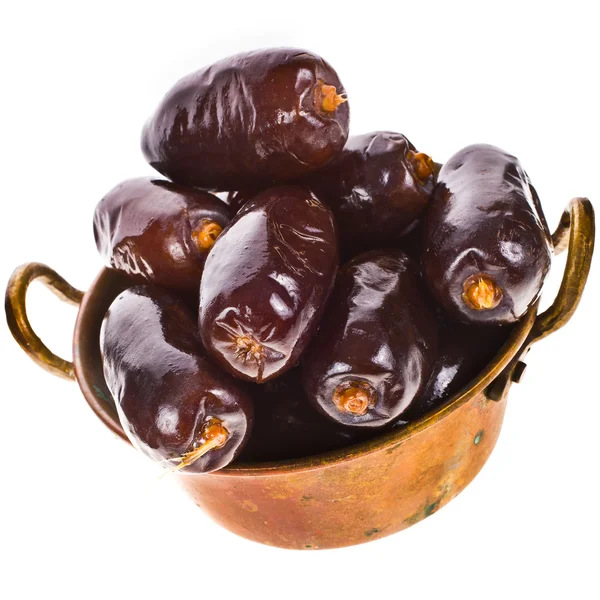 Fresh big dates in copper bowl isolated on white background — Stock Photo, Image