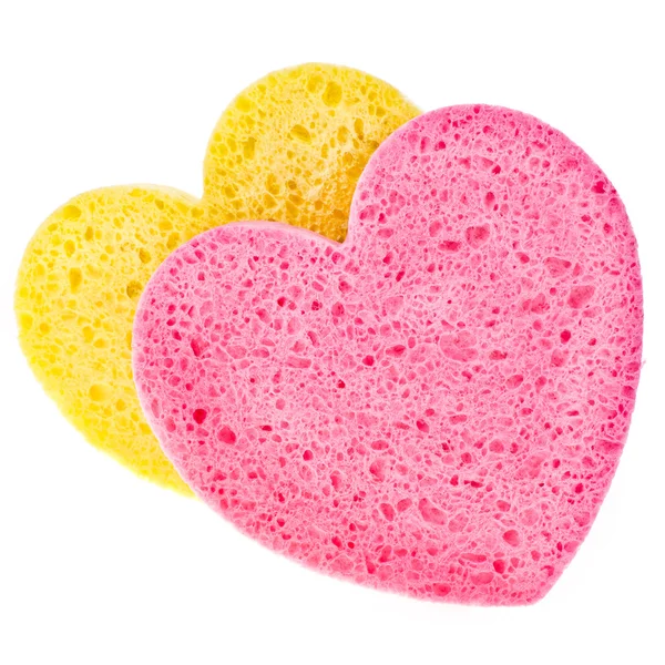 Esponja baño amarillo y rosa en forma de corazón aislado sobre fondo blanco — Foto de Stock