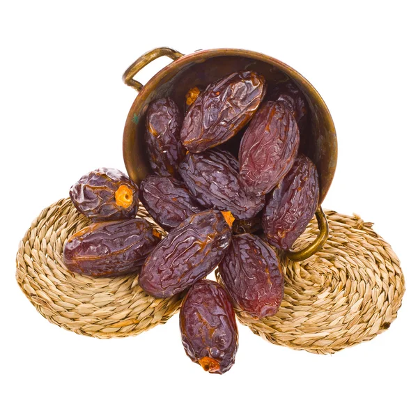 Dried dates in a copper basin — Stock Photo, Image