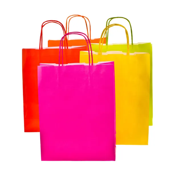 Bolsas de compras de papel de colores brillantes aisladas sobre fondo blanco — Foto de Stock