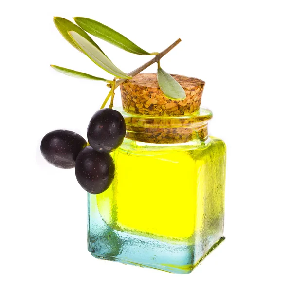 Маленькая стеклянная бутылка с оливковым маслом — стоковое фото