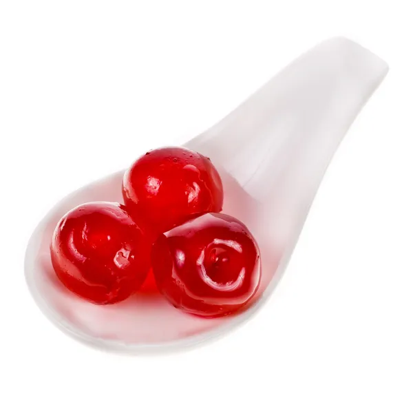 Słodkie kandyzowane owoce wiśni w biały ceramiczna miska na białym tle na białym tle — Zdjęcie stockowe