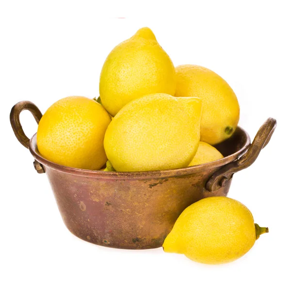 Fresh lemons in copper bowl isolated on white background — Stock Photo, Image
