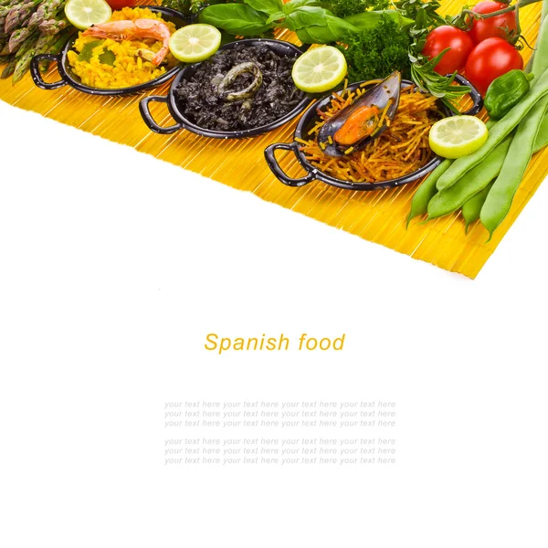 Spanish Mediterranean sea food - black rice, paella, noodles — Stock Photo, Image