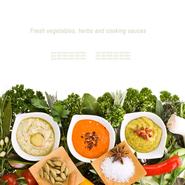 Fresh vegetables and herbs and cooking sauces — Stock Photo, Image