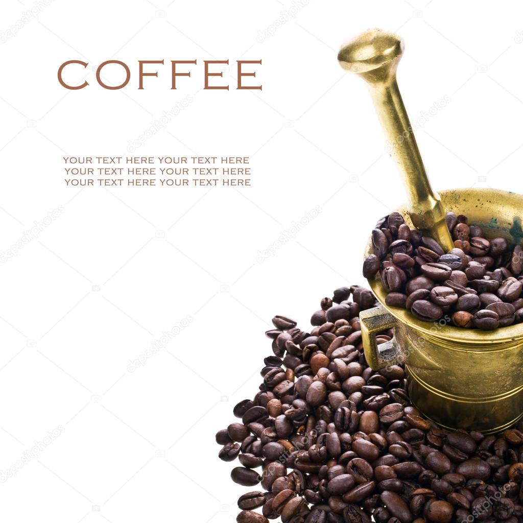 Rolled in coffee beans and old mortar and pestle isolated on white