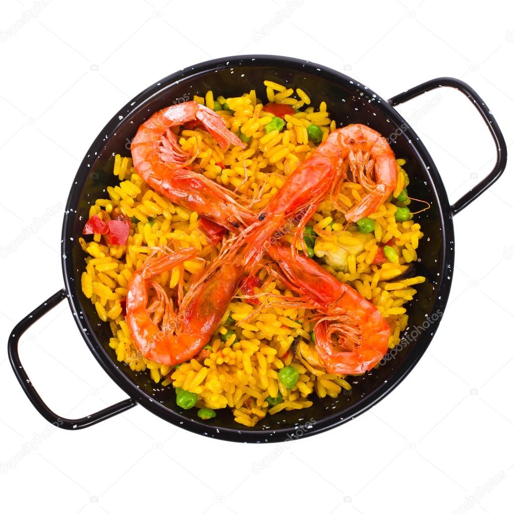 Traditional spanish rice - paella isolated on white background