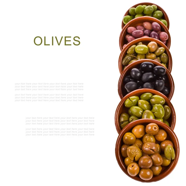 Different varieties of olives marinated in traditional clay bowls isolated on white background — Stock Photo, Image