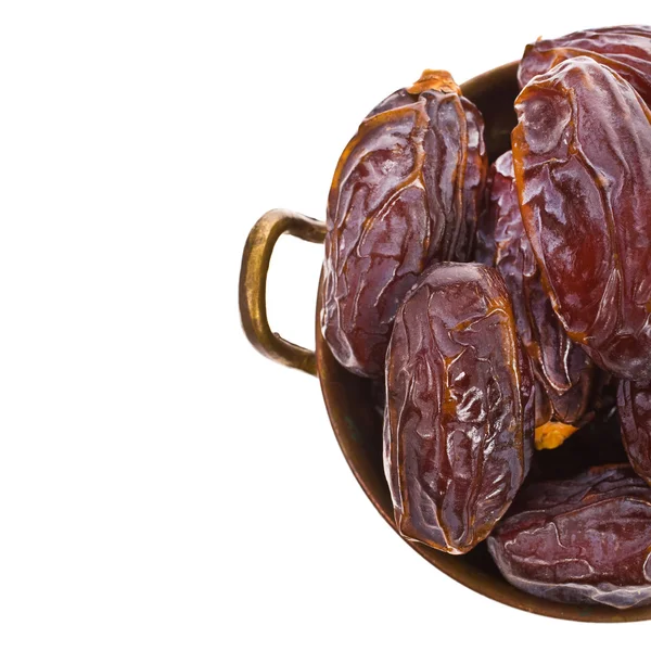 Fresh big dates in copper bowl — Stock Photo, Image