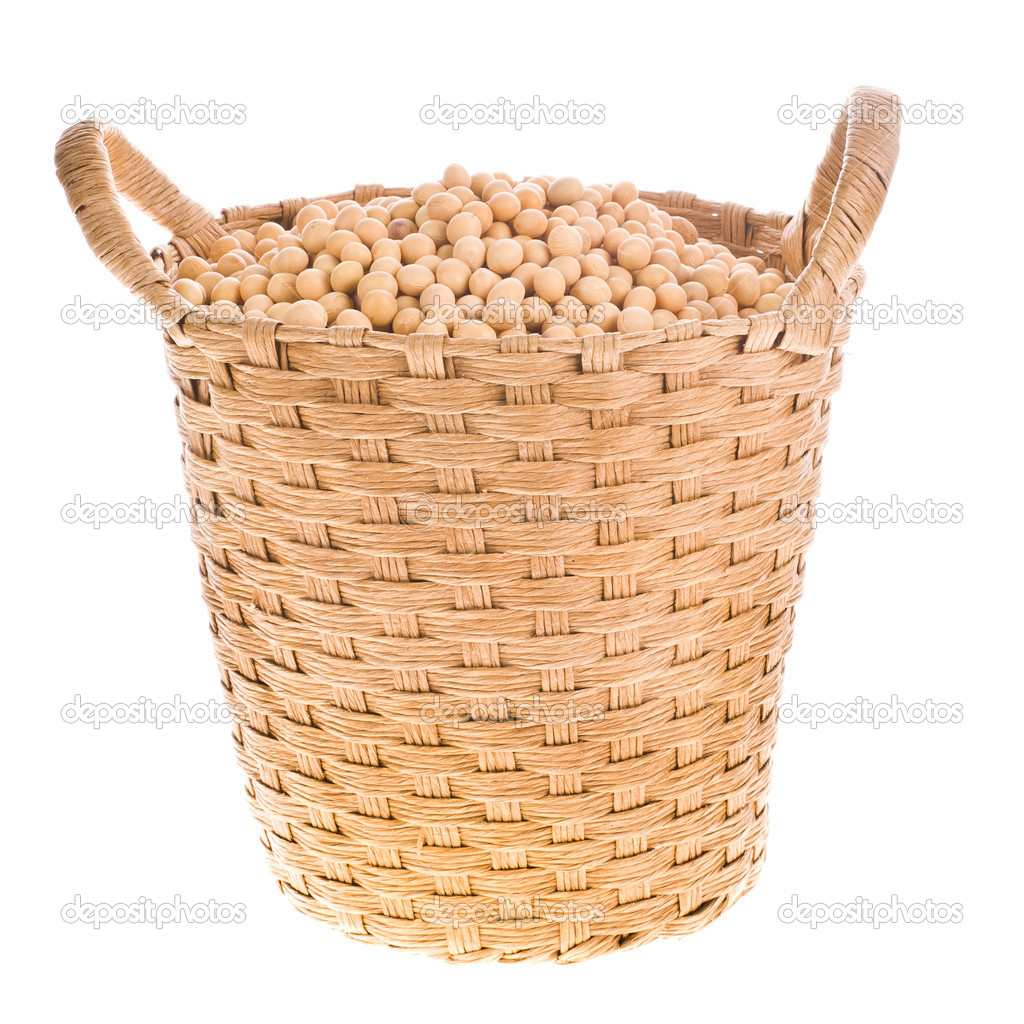 Soybeans in a wicker basket, isolated on white background