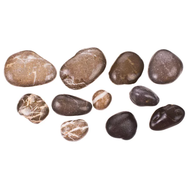 A lot of wet sea stones dark isolated on white background — Stock Photo, Image