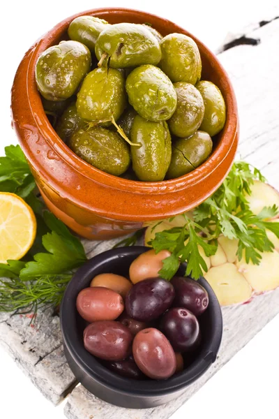 Marinated olives in pottery — Stock Photo, Image