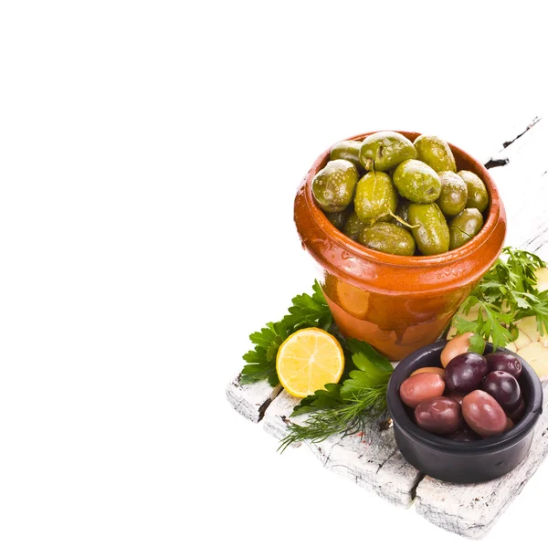 Marinated olives in pottery — Stock Photo, Image