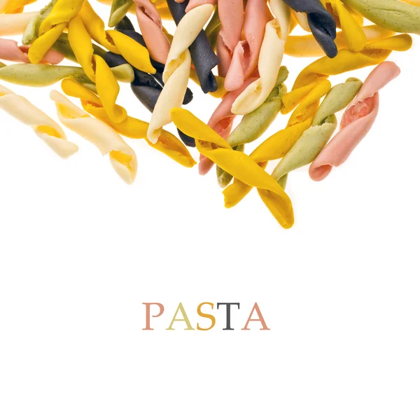Closeup multicolored pasta scattered — Stock Photo, Image