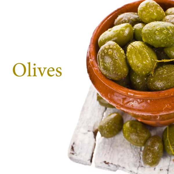 Big marinated olives in a clay pot — Stock Photo, Image