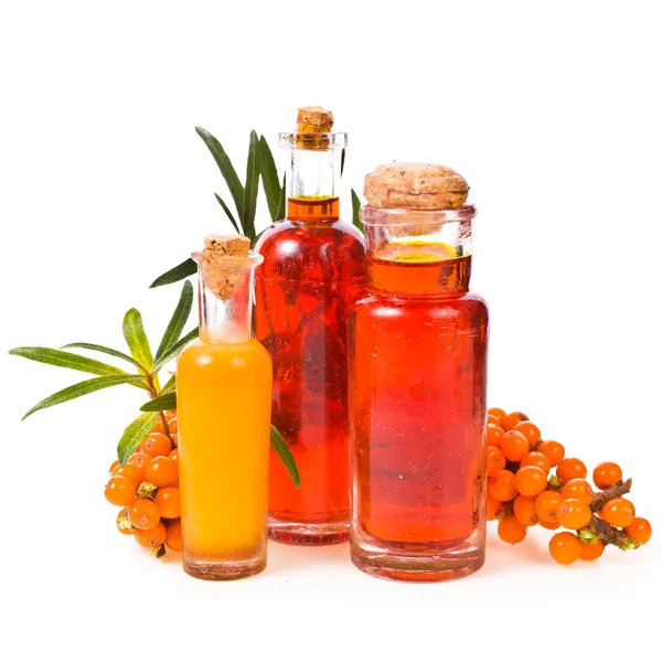 Bottles with oil and juice of sea buckthorn — Stock Photo, Image
