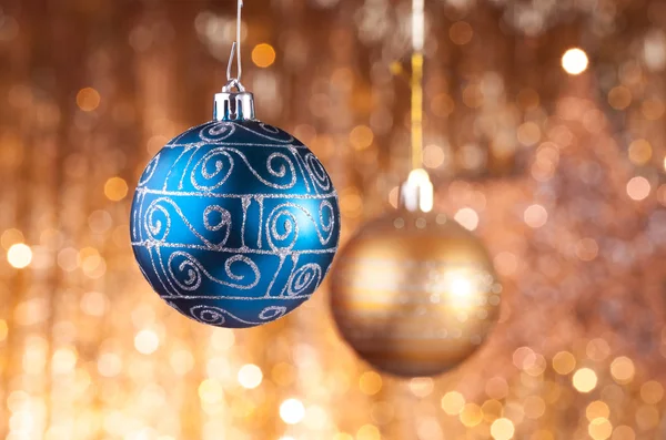 Blue and gold christmas baubles — Stock Photo, Image