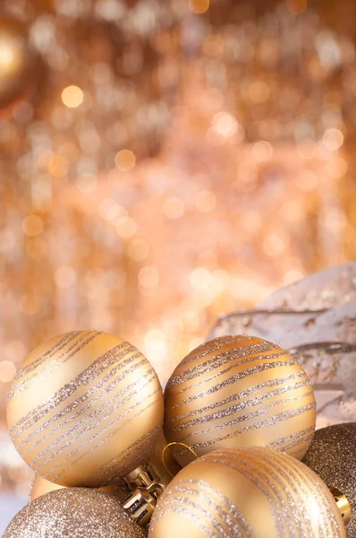 Gold christmas baubles — Stock Photo, Image