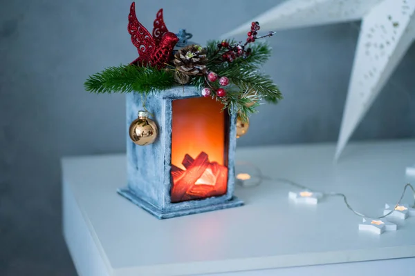 Christmas lantern made of wood stands on the table — Foto Stock