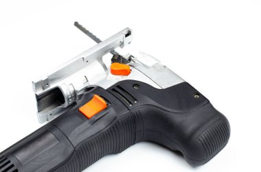 Elektrikli yapboz. Tahta işçiliği aletleri. Yapboz. Beyaz bir arka planda. Atölye.