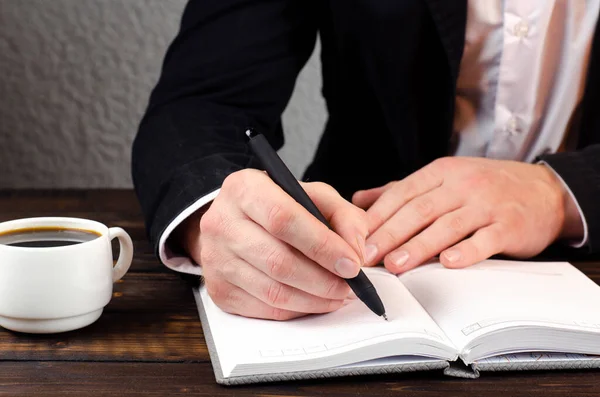 Hand Businessman Writes Notebook Business Man Plans Writing Notebook Desk — Stockfoto