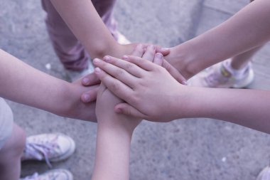 People's hands. Team concept. Many hands are clasped together.