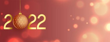 Mutlu yıllar 2022 Bokeh bayrağı ve noel balosu