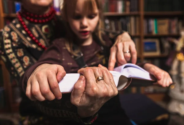 Grandmother Granddaughter Read Big Book Home Library Close Old Hands — 图库照片