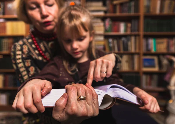 Grandmother Granddaughter Read Big Book Home Library Close Old Hands — 图库照片