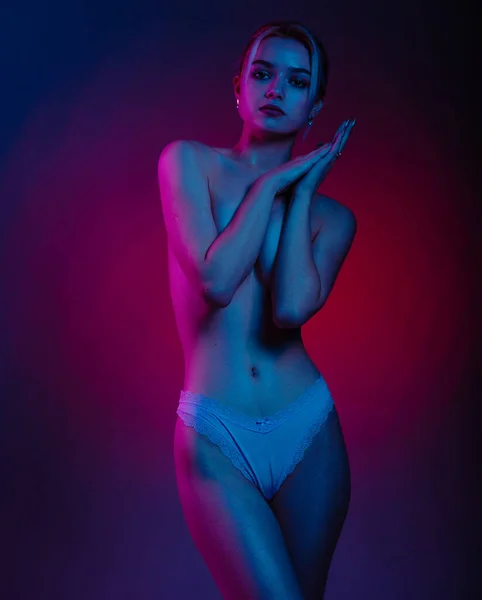 Nude Woman Colorful Bright Neon Lights Cover Breast Hands Posing — Stock Photo, Image