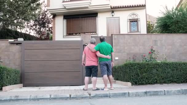 Back View Anonymous Mature Husbands Hugging Observing New House While — Stock Video