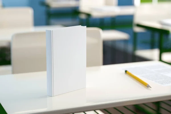 Mock up of textbook with blank white cover placed on table near pencil in classroom at school. 3d render