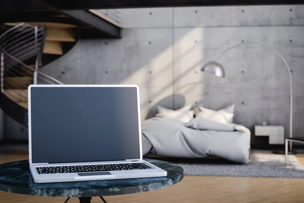 Mock up of laptop over table in light stylish bedroom with bed on blurred background in apartment. 3d render