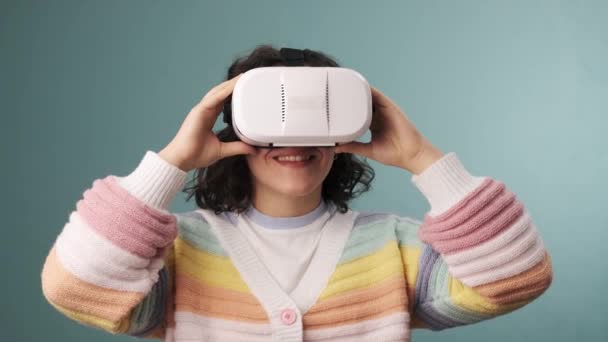 Woman Experiencing Virtual Reality Glasses Isolated Background Slow Motion Video — Video