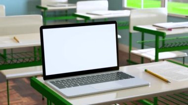 Modern laptop with white blank screen placed on desk against classroom at school. Ready for your design. 3d animation