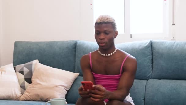 Lucky Black Trans Person Lying Couch Using Smartphone Winning Lottery — Stock Video