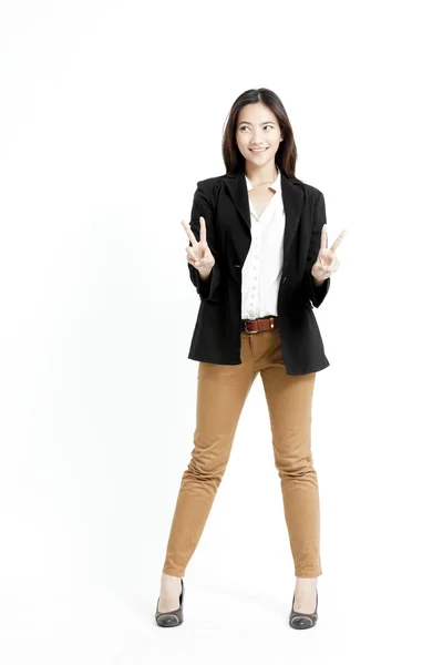 Happy business woman showing victory sign hand gesture over white background — Stock Photo, Image