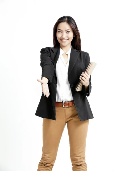 Business woman holding tablet computer and giving handshake — Stock Photo, Image