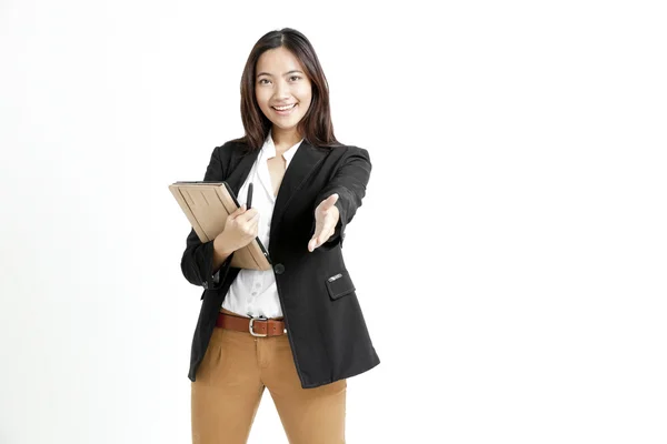 Business woman holding tablet computer and giving handshake — Zdjęcie stockowe