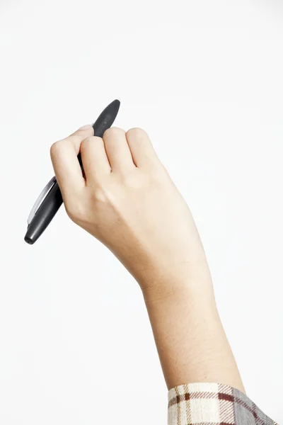 Zakenvrouw met een pen in haar hand — Stockfoto