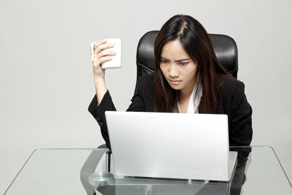Bored woman at her desk