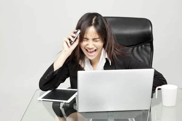 Bored woman at her desk — Stock Photo, Image