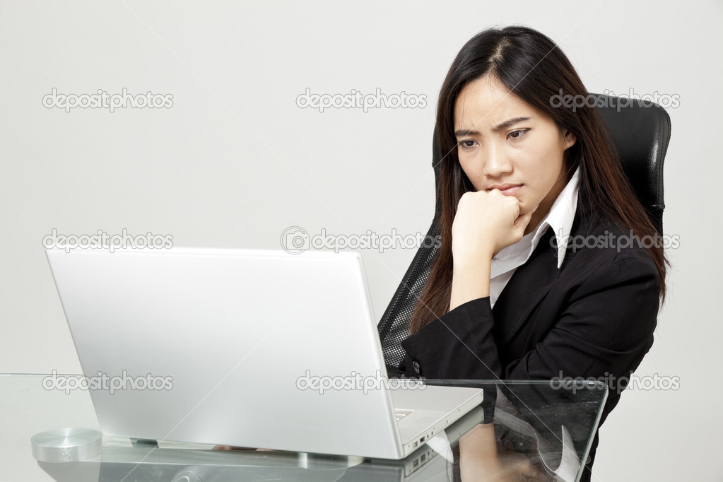 Bored woman at her desk